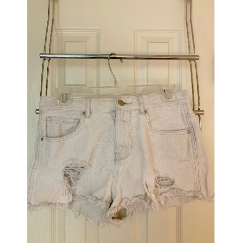 Women’s distressed white jean shorts